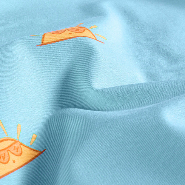Baumwolljersey mit Sonnenmotiv in Aqua